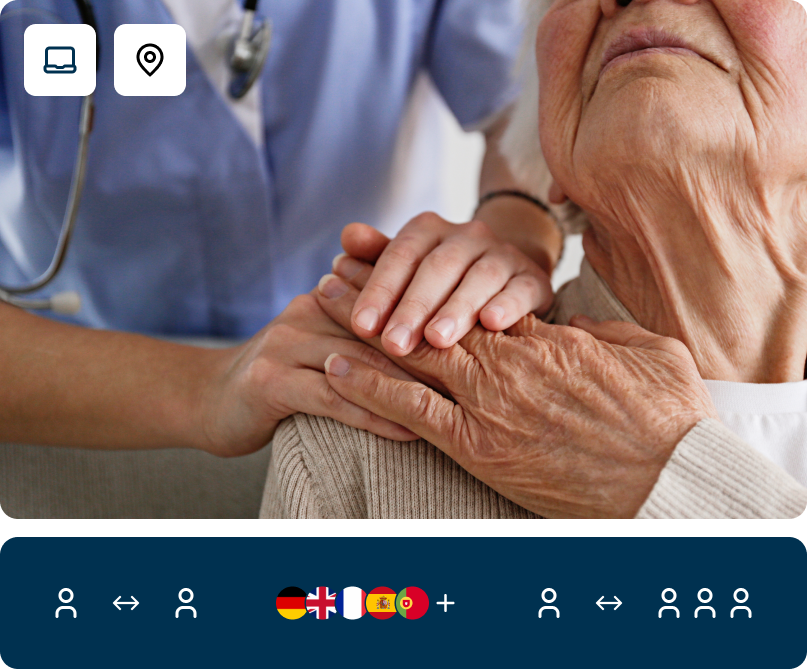 Junge internationale Pflegerin im wertschätzenden Austausch mit älterer Patientin - dank sprachlicher Weiterbildung bei FOKUS Sprachen im Kurs Deutsch für Pflegeberufe.